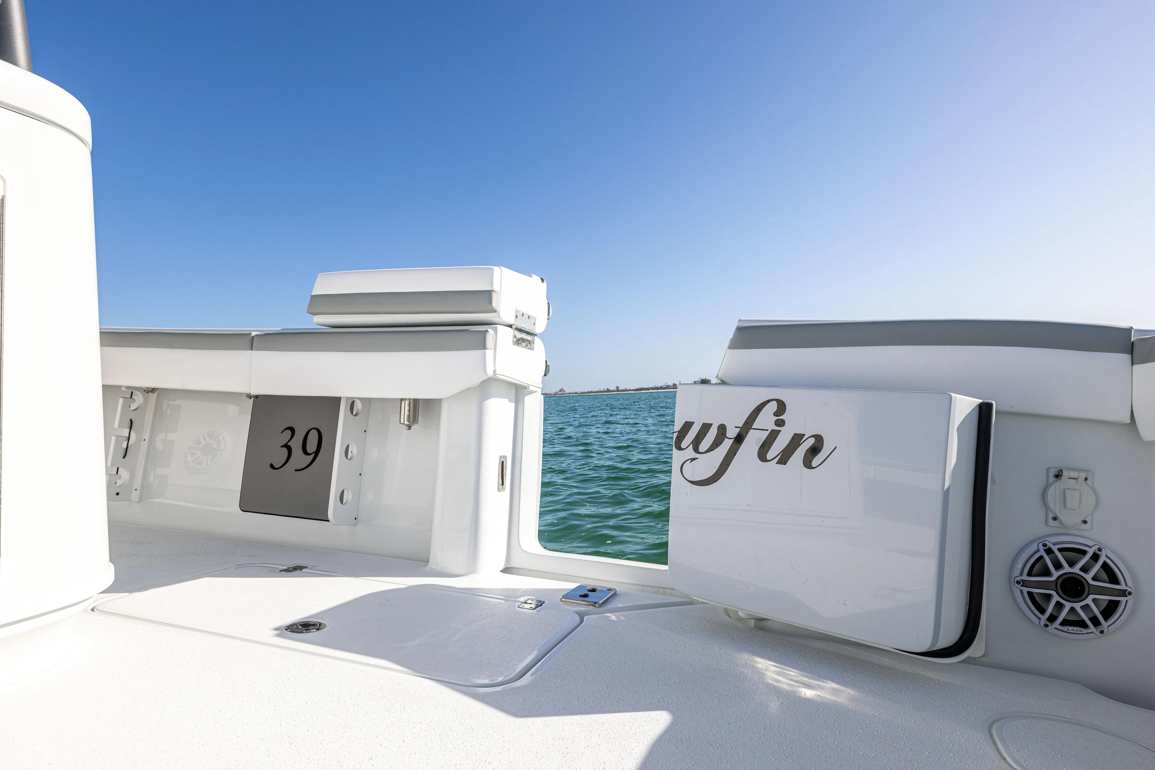  Yacht Photos Pics 2023 Yellowfin 39 Offshore boat deck with ocean view and clear blue sky.