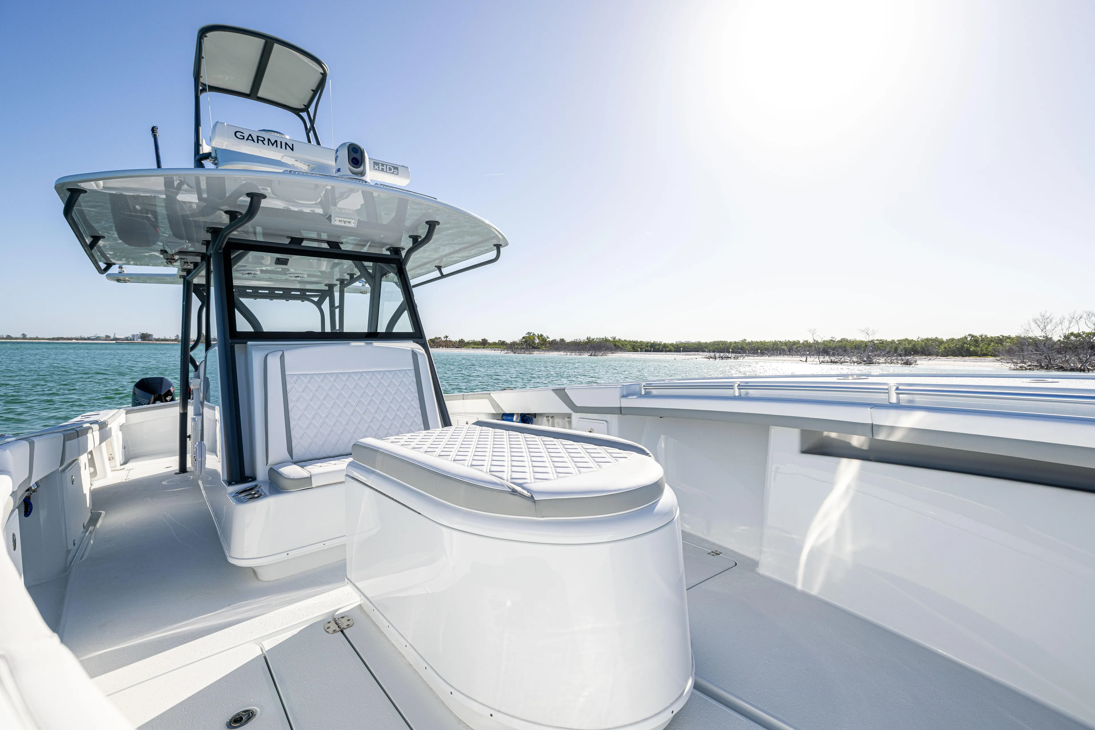  Yacht Photos Pics 2023 Yellowfin 39 Offshore boat on water, featuring sleek design and spacious deck.