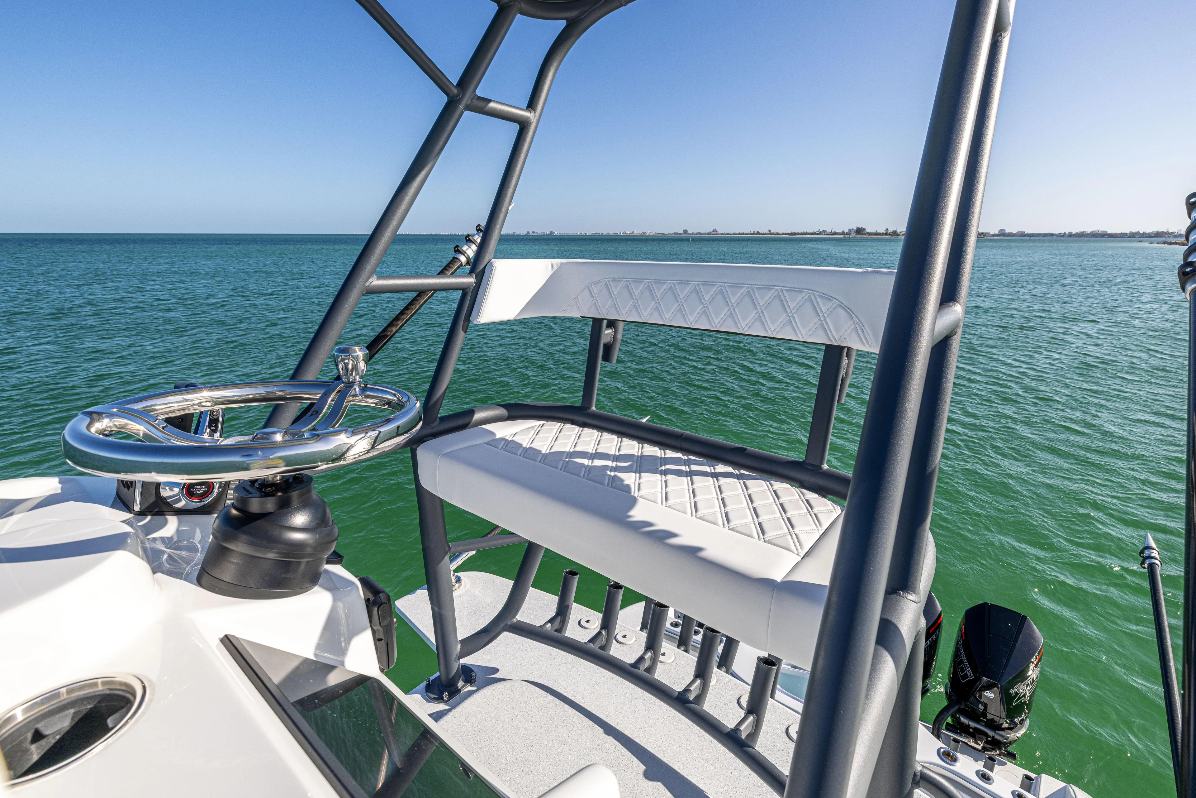  Yacht Photos Pics 2023 Yellowfin 39 Offshore boat helm with ocean view, featuring sleek design and modern controls.