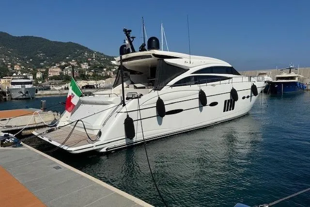  Yacht Photos Pics Luxury 2014 Princess V 72 yacht docked in scenic marina with Italian flag.