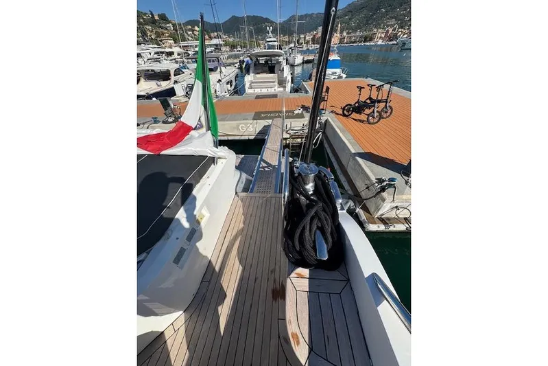  Yacht Photos Pics 2014 Princess V 72 yacht docked at marina with Italian flag.