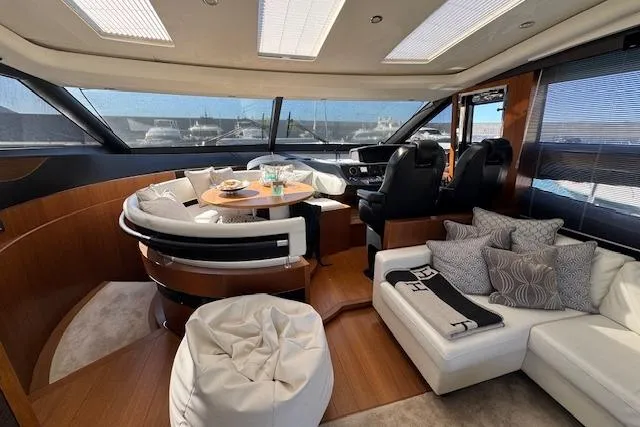  Yacht Photos Pics Luxurious interior of 2014 Princess V 72 yacht with elegant seating and dining area.