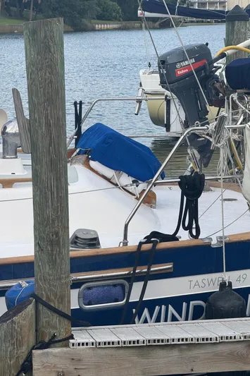 Windsong Yacht Photos Pics Sailboat docked, Taswell 49 model from 1989, with Yamaha outboard motor.