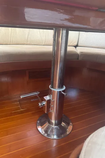 Windsong Yacht Photos Pics Interior of 1989 Taswell 49 yacht with polished metal table pedestal.