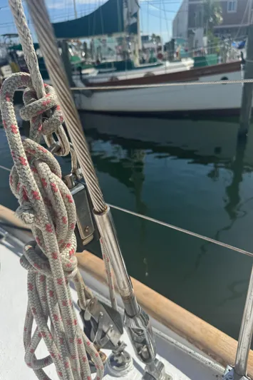 Windsong Yacht Photos Pics Sailboat rigging on a 1989 Taswell 49, docked in a marina.