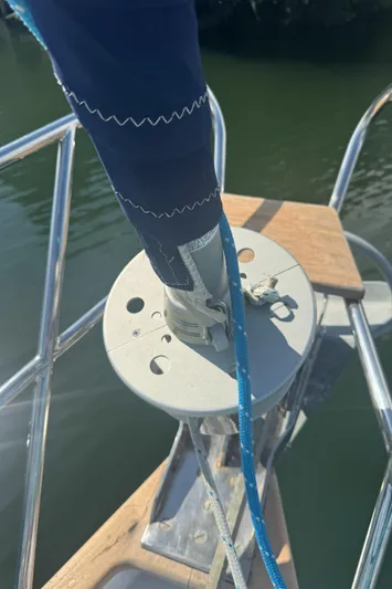 Windsong Yacht Photos Pics Close-up of a 1989 Taswell 49 sailboat's bow with rigging and deck details.