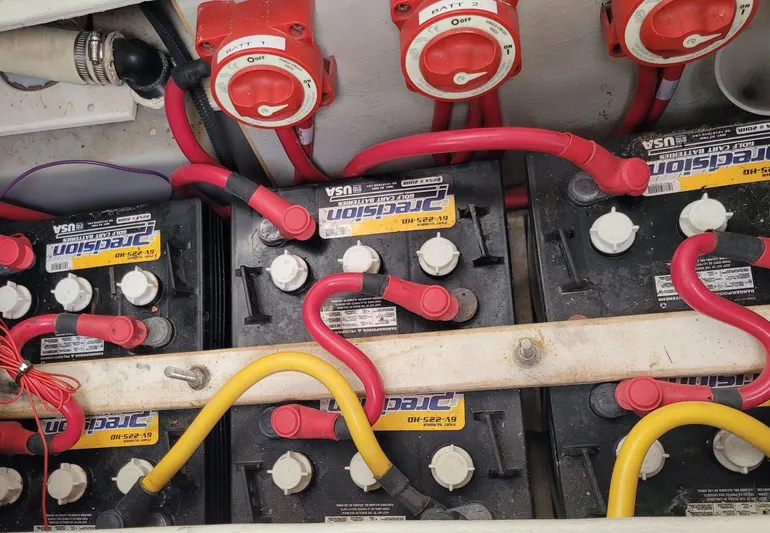 Storyteller Yacht Photos Pics Battery compartment of a 2007 Manta 42 Mk IV sailing catamaran with wiring and switches.