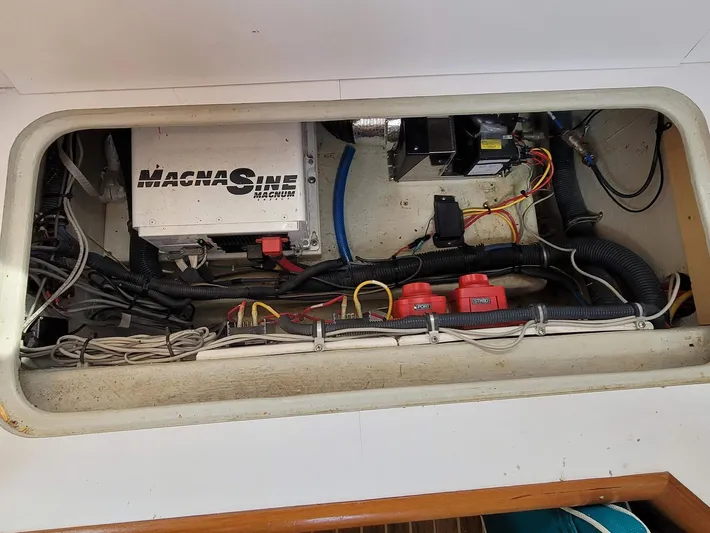 Storyteller Yacht Photos Pics Electrical compartment of 2007 Manta 42 Mk IV sailing catamaran with wiring and components.