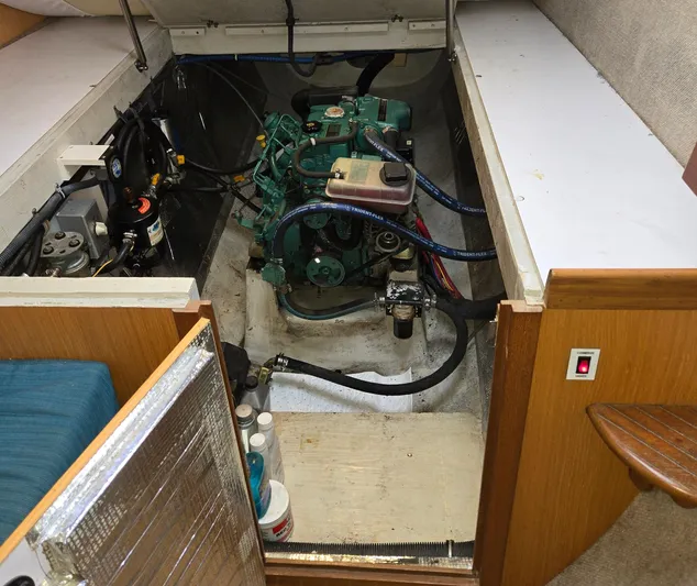 Storyteller Yacht Photos Pics Engine compartment of a 2007 Manta 42 Mk IV sailing catamaran, showcasing mechanical components.