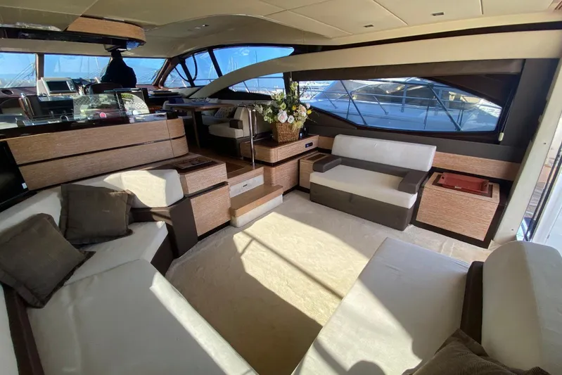  Yacht Photos Pics Luxurious interior of a 2011 Azimut 58 yacht with elegant seating and modern design.