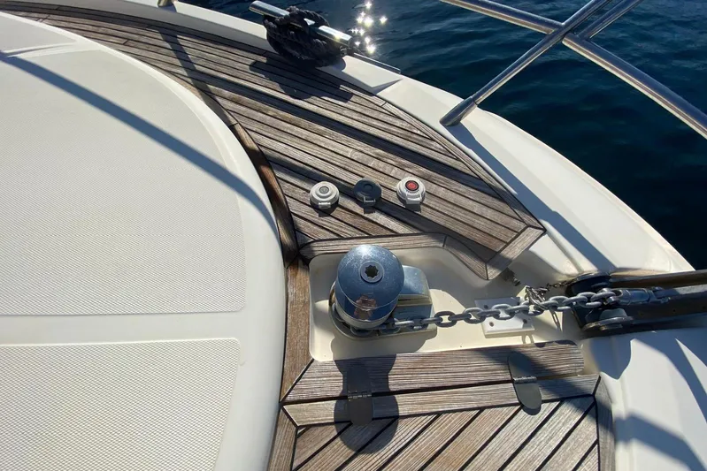  Yacht Photos Pics Deck of 2011 Azimut 58 yacht with anchor chain and wooden flooring.
