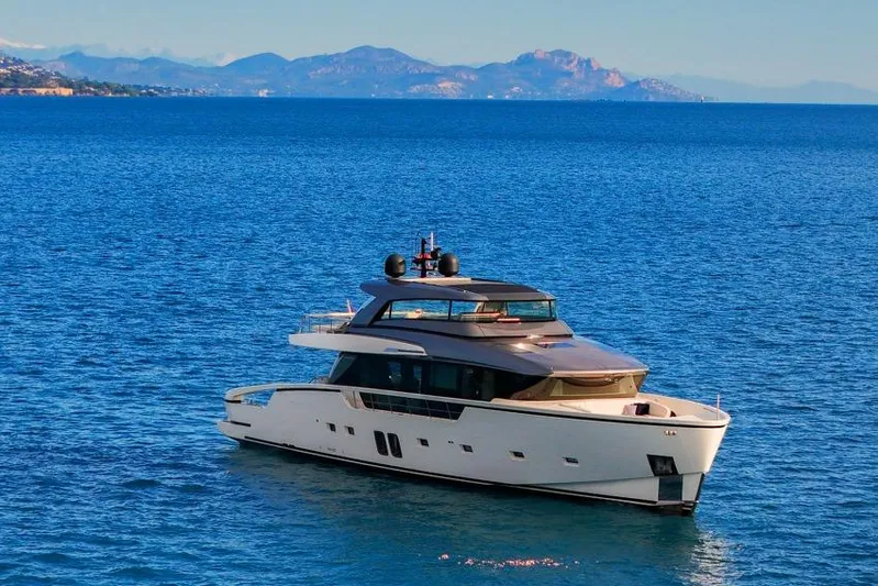 Vinci II Yacht Photos Pics Luxury 2019 Sanlorenzo SX88 yacht cruising on serene blue waters.