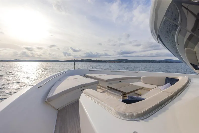 Vinci II Yacht Photos Pics Luxurious 2019 Sanlorenzo SX88 yacht deck with elegant seating, overlooking serene ocean view.