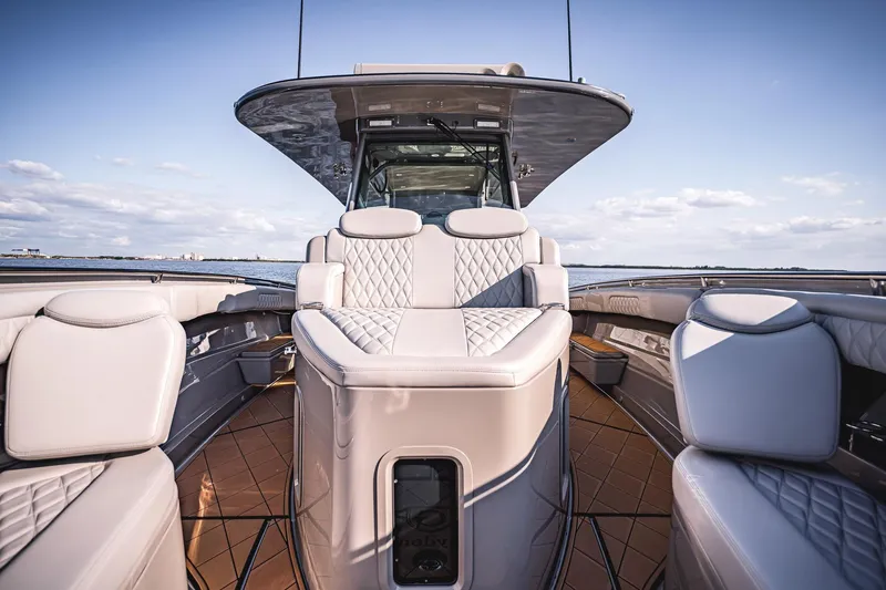 Fifty Shades Of Graydon Yacht Photos Pics Luxurious 2023 HCB 42 Lujo boat interior with plush seating and sleek design.