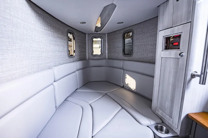 Fifty Shades Of Graydon Yacht Photos Pics Luxurious interior of 2023 HCB 42 Lujo boat with sleek seating and modern design.