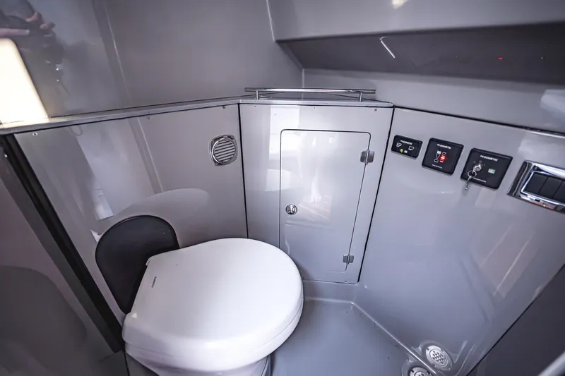 Fifty Shades Of Graydon Yacht Photos Pics 2023 HCB 42 Lujo boat bathroom with modern fixtures and control panel.