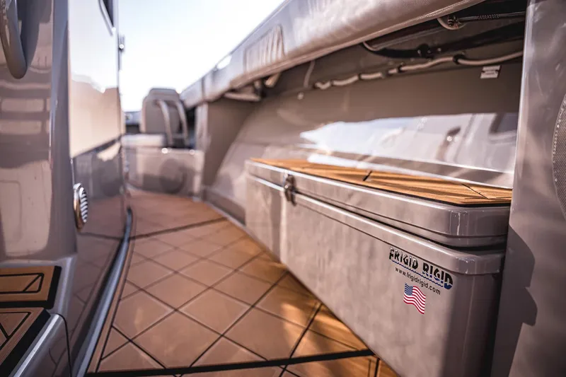 Fifty Shades Of Graydon Yacht Photos Pics 2023 HCB 42 Lujo boat interior with teak flooring and storage compartment.