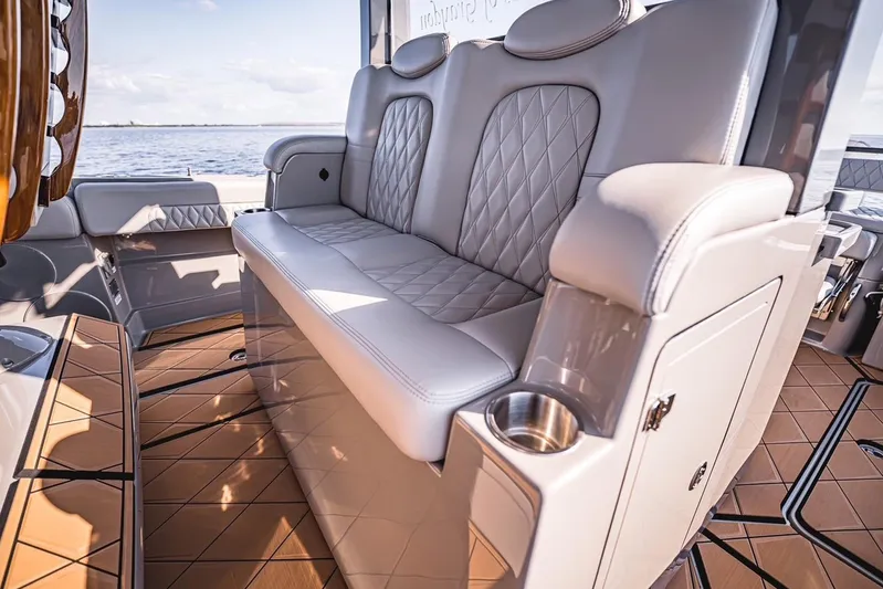 Fifty Shades Of Graydon Yacht Photos Pics Luxurious seating on 2023 HCB 42 Lujo boat with elegant diamond-stitched upholstery.