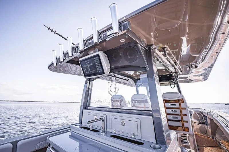 Fifty Shades Of Graydon Yacht Photos Pics 2023 HCB 42 Lujo luxury boat with advanced navigation system and sleek design on open water.