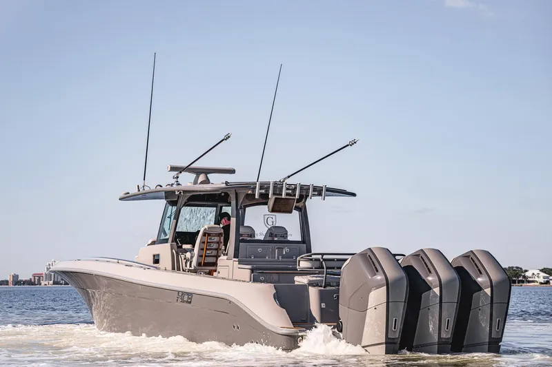 Fifty Shades Of Graydon Yacht Photos Pics 2023 HCB 42 Lujo boat cruising with four powerful engines on a sunny day.