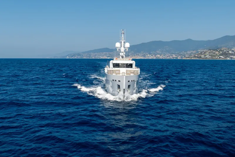 Preference 19 Yacht Photos Pics Tansu Custom 2011 yacht cruising on open sea with coastal background.