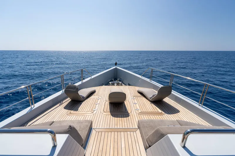 Preference 19 Yacht Photos Pics Luxurious Tansu Custom yacht deck, 2011 model, with sun loungers overlooking the ocean.