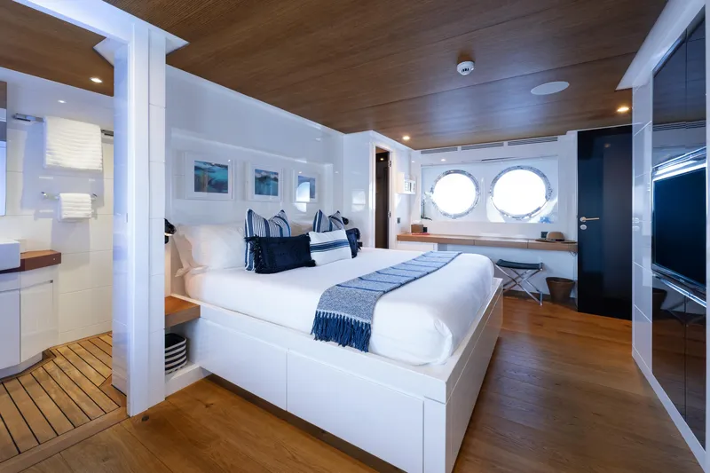 Preference 19 Yacht Photos Pics Luxurious Tansu Custom yacht bedroom, 2011 model, featuring elegant decor and porthole windows.