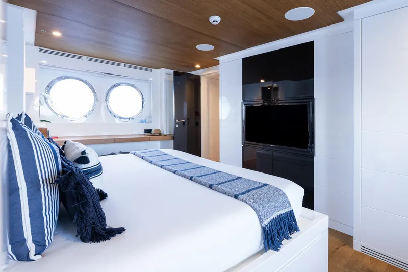Preference 19 Yacht Photos Pics Luxurious Tansu Custom yacht bedroom, 2011 model, featuring elegant decor and porthole windows.