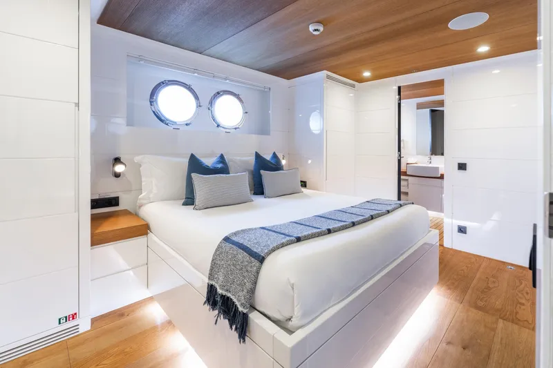 Preference 19 Yacht Photos Pics Luxurious Tansu Custom yacht bedroom, 2011 model, featuring modern design and elegant wood accents.