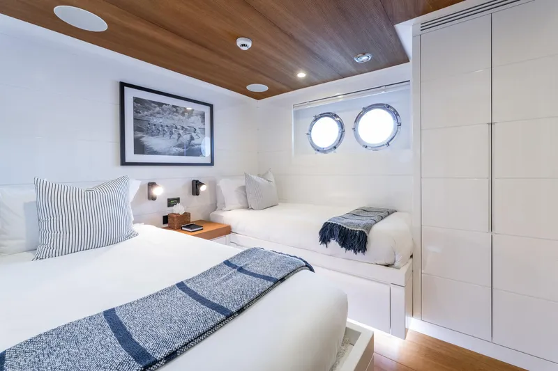 Preference 19 Yacht Photos Pics Luxurious Tansu Custom yacht bedroom, 2011 model, featuring twin beds and nautical decor.