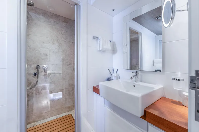 Preference 19 Yacht Photos Pics Luxurious yacht bathroom with modern sink, wooden accents, and spacious shower. Tansu Custom 2011.
