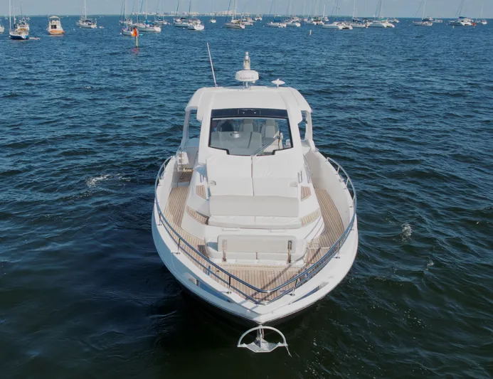Le Kiki Yacht Photos Pics Azimut 40 Verve 2019 yacht on open water, front view, surrounded by boats.