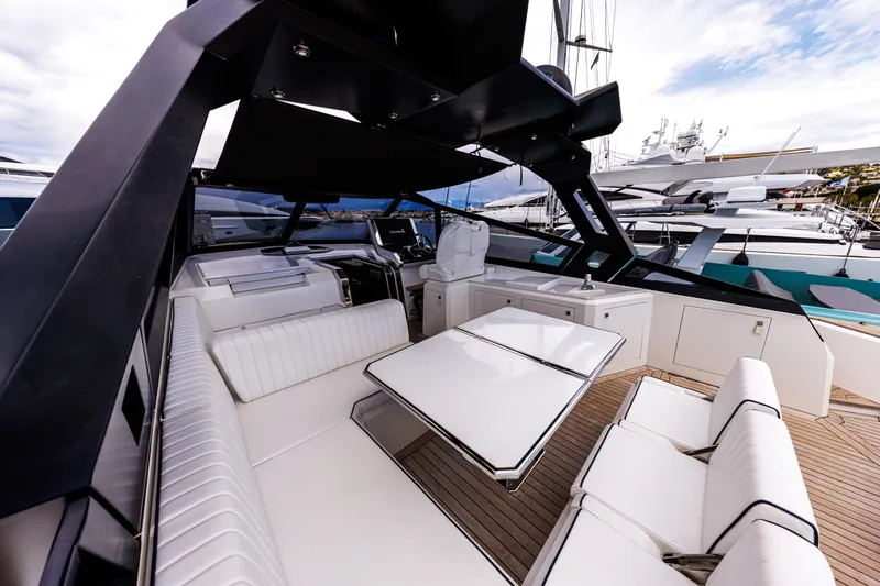  Yacht Photos Pics Luxurious 2020 Evo R6 yacht interior with sleek white seating and modern design.