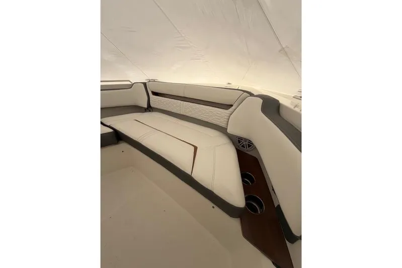  Yacht Photos Pics 2021 Tiara Sport 38 LS boat interior with luxurious seating and cup holders.