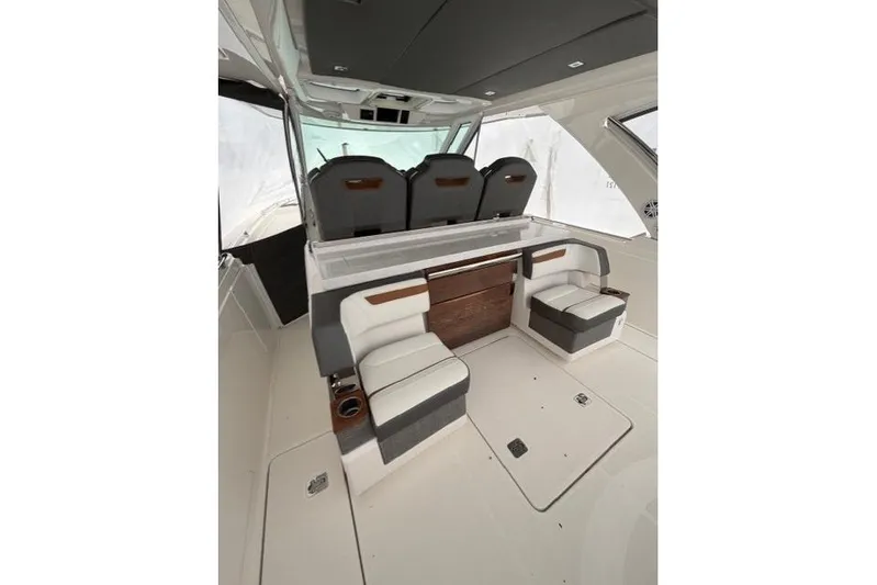  Yacht Photos Pics 2021 Tiara Sport 38 LS interior with luxurious seating and modern design.