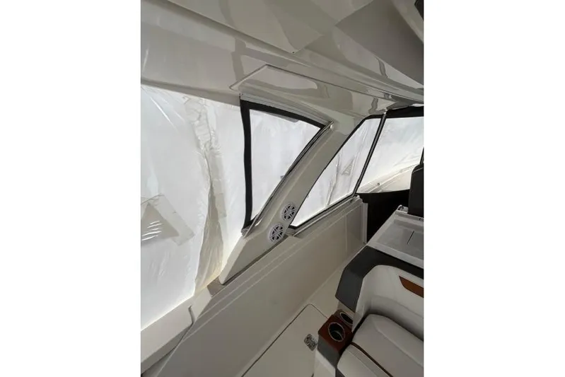  Yacht Photos Pics Interior view of 2021 Tiara Sport 38 LS boat, featuring sleek design and seating.