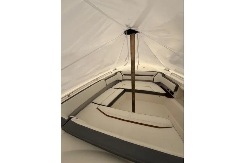  Yacht Photos Pics Interior view of 2021 Tiara Sport 38 LS boat under protective cover.