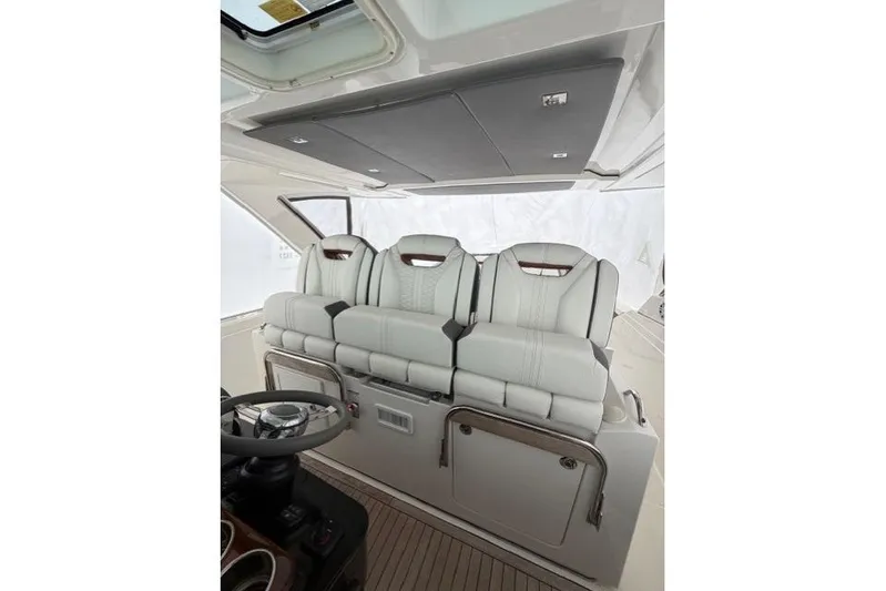  Yacht Photos Pics 2021 Tiara Sport 38 LS boat interior with luxurious seating and modern design.