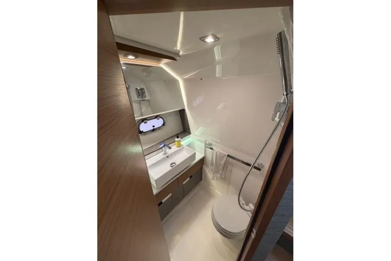  Yacht Photos Pics 2021 Tiara Sport 38 LS yacht bathroom with modern fixtures and sleek design.