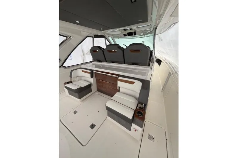  Yacht Photos Pics 2021 Tiara Sport 38 LS interior with modern seating and sleek design.