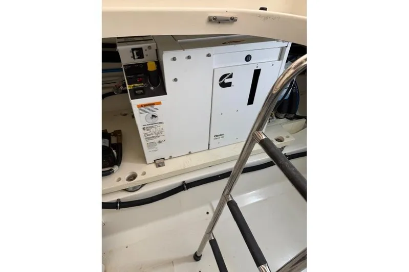  Yacht Photos Pics 2021 Tiara Sport 38 LS boat engine compartment with Cummins generator.