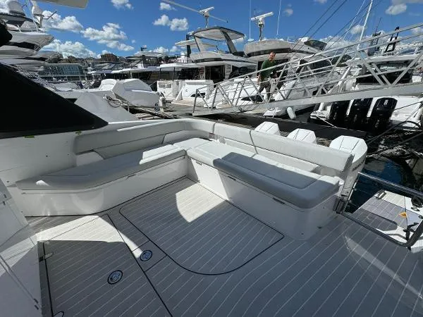 No Name Yacht Photos Pics 2024 Azimut Verve 42 yacht with spacious deck seating at a marina.