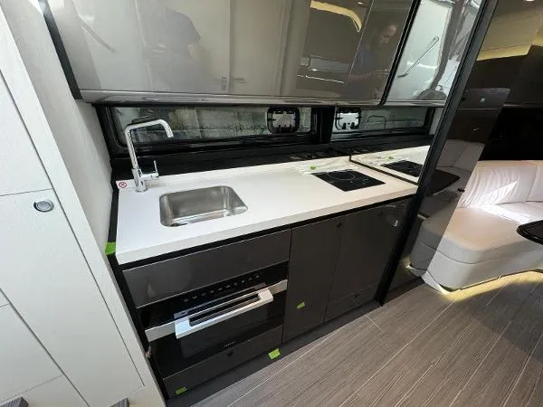 No Name Yacht Photos Pics 2024 Azimut Verve 42 yacht interior kitchen with modern appliances and sleek design.