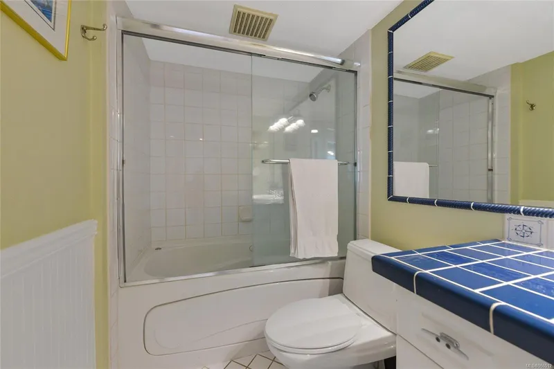  Yacht Photos Pics Modern bathroom in 2005 Custom Float Home with tiled countertop and glass shower enclosure.