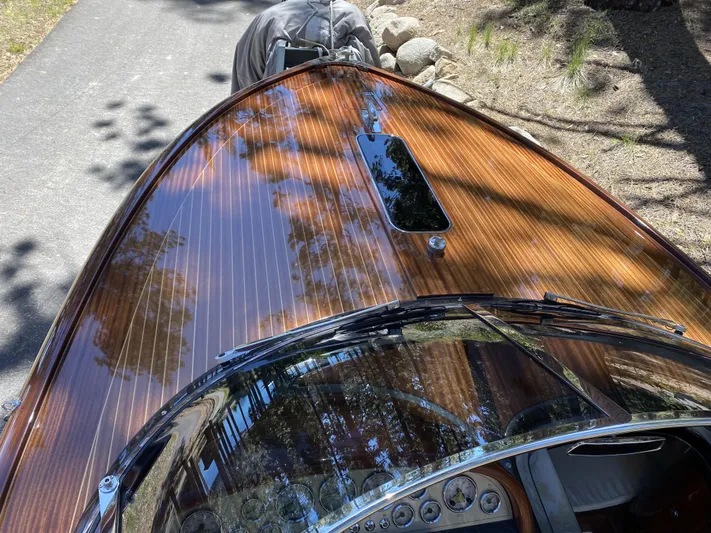 Chinkapin Yacht Photos Pics 2016 Riva Aquariva Super boat with polished wooden deck and sleek design.