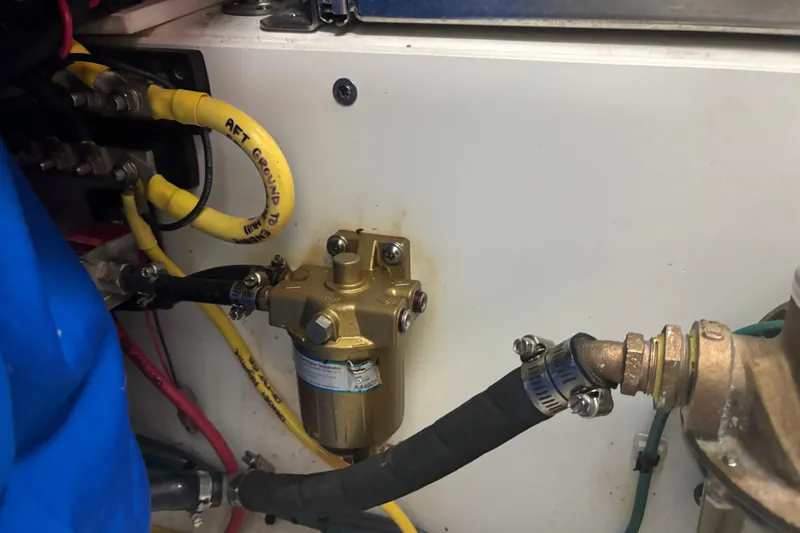  Yacht Photos Pics Engine compartment of 2020 Pursuit DC 365 Dual Console with fuel filter and hoses.