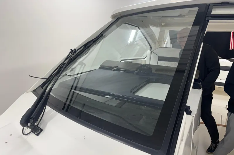  Yacht Photos Pics 2020 Pursuit DC 365 Dual Console boat windshield and interior view.