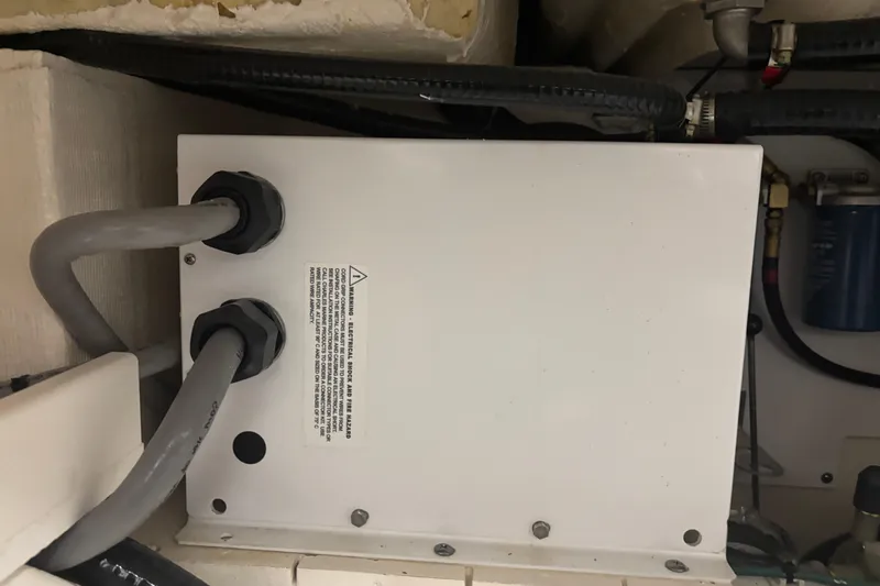  Yacht Photos Pics Electrical box with cables inside a 2020 Pursuit DC 365 Dual Console boat.