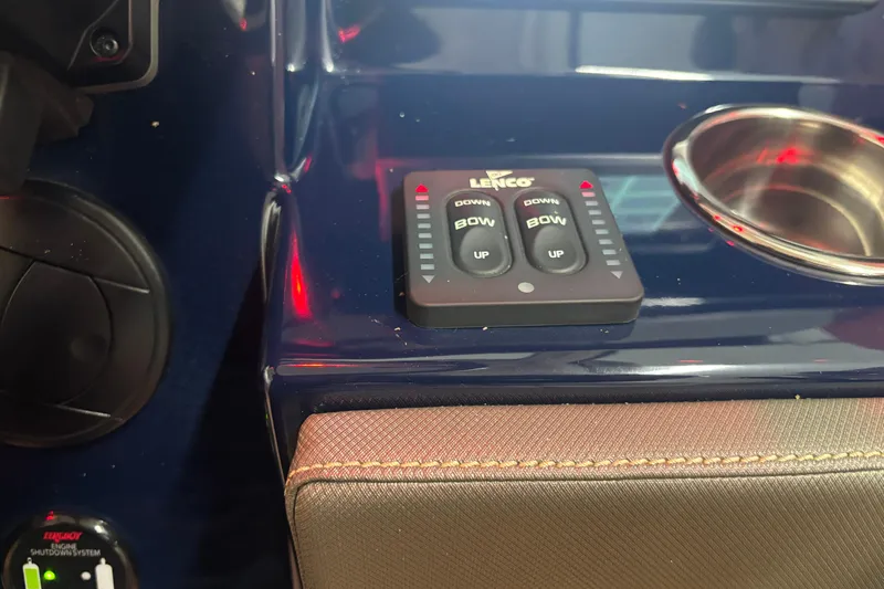  Yacht Photos Pics Control panel of a 2020 Pursuit DC 365 Dual Console boat with Lenco trim tab switches.
