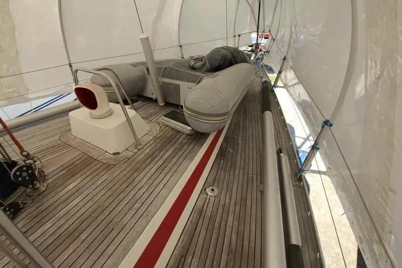 Le Reve Yacht Photos Pics Deck of 1983 Nautor Swan 46mkI yacht with inflatable dinghy under cover.